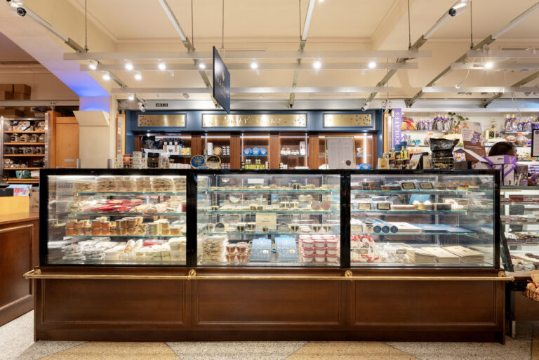 A bakery with a glass display case.