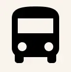 A black icon of a bus on a white background.