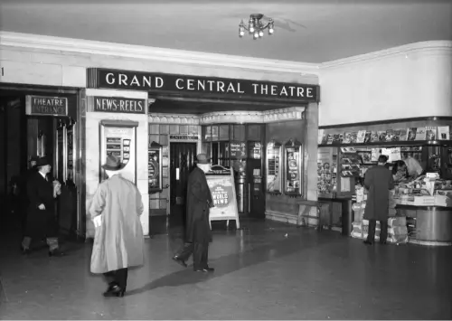 A black and white photo of the grand central theatre.